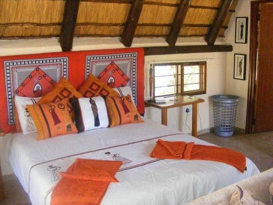 Bedroom with African decor (TG Website)