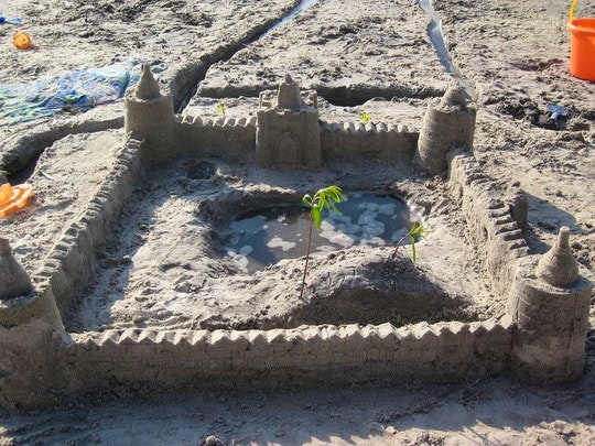 Building a sandcastle. By brenbot (Flickr)