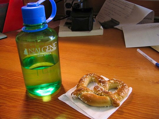 Refillable bottle and snacks for the plane. By redjar (Flickr)