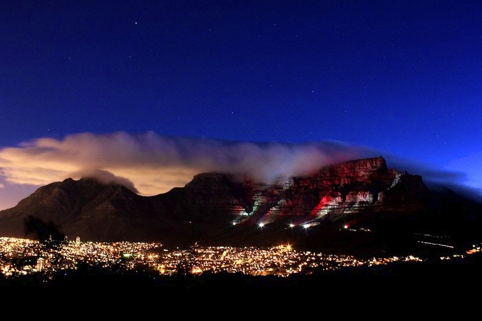Table Mountain lit up in red for World Aids Day by Eleanor Muller (Flickr)