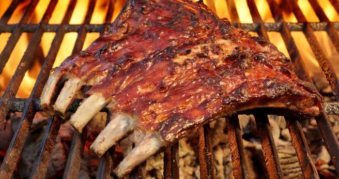 Pork Spare Ribs On The Hot Flaming Barbecue Grill by David Horn (Flickr)