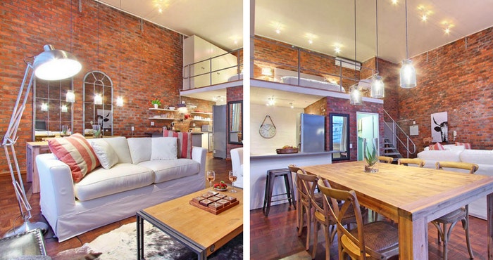 The industrial standing lamps add to the urban feel in the living room (left); The large wooden dining table adds a rustic twist (right) | Photos: TravelGround